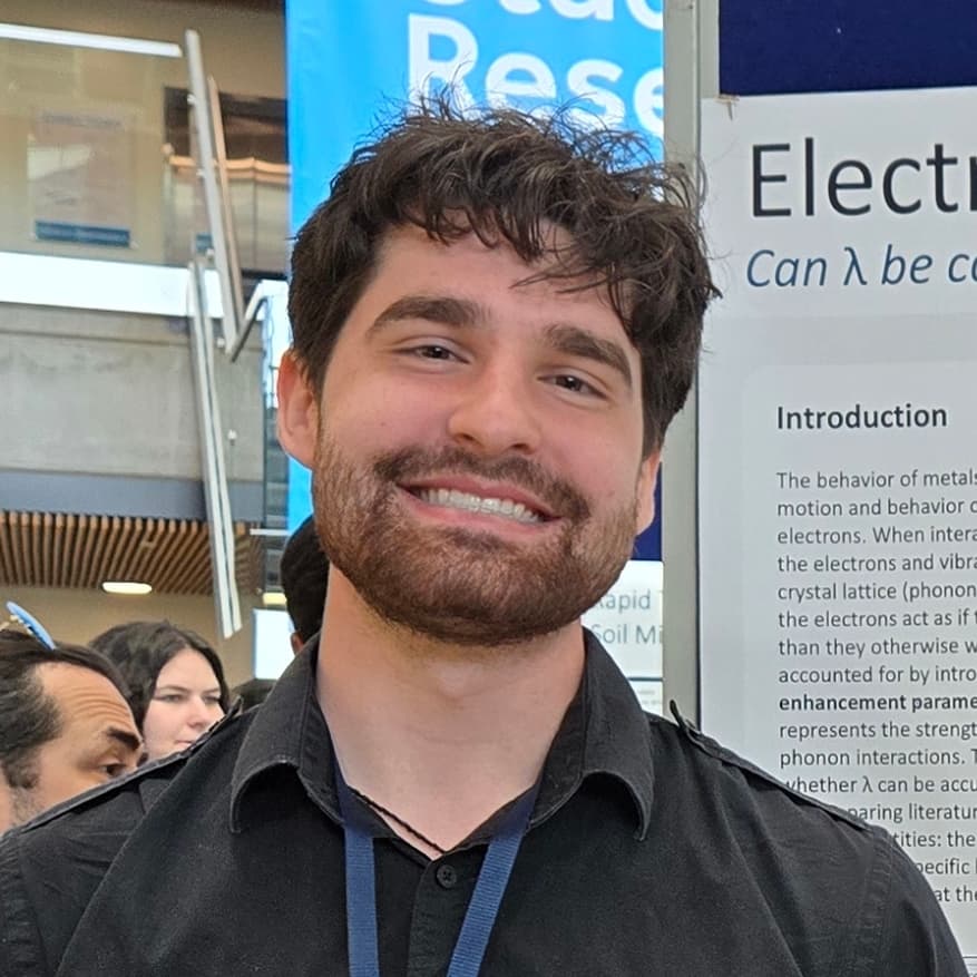 A picture of me, presenting my physics research